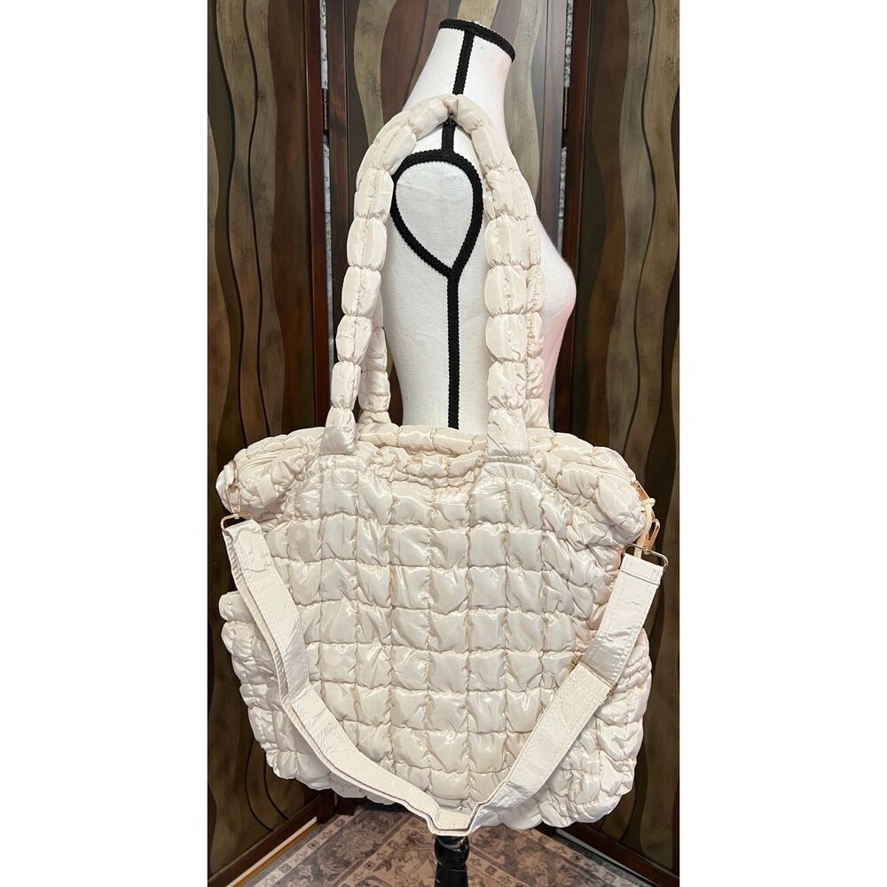 NWOT Unbranded ivory-colored puffer tote bag with matching clutch